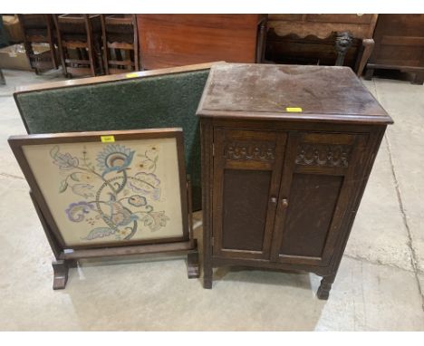 An embroidered firescreen; a bridge table and an oak record cabinet (3)