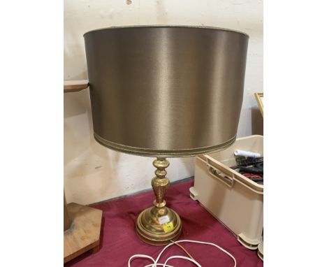 A brass table lamp