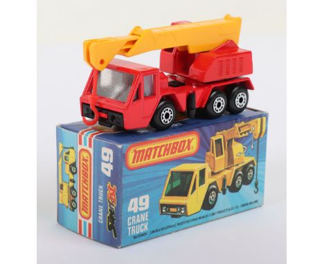Matchbox Superfast 49c Crane Truck with RED body & CLEAR glass (can be Green glass also), model is very near mint in a near m
