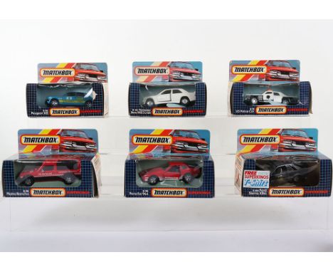 Six Boxed  Matchbox Superkings Cars, K-78 US Plymouth Police Car,K-84 Peugeot 305, K-90 Matra Rancho,  K-98 Porsche 944, K100