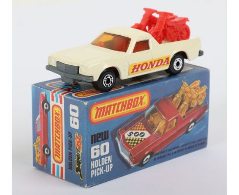 Matchbox Superfast 60c Holden Pick-Up with scarcer HONDA labels, model is very near mint to mint in a mint L box, box variati