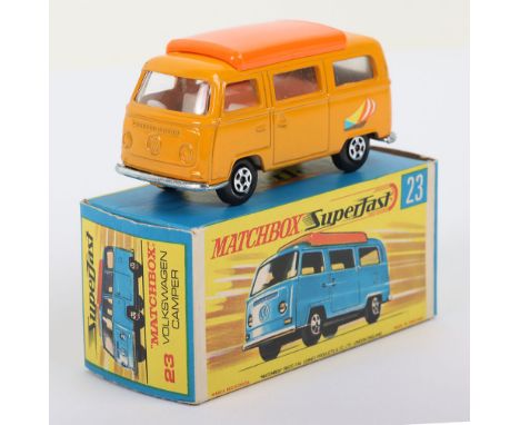 Matchbox Superfast 23a Volkswagen Camper with Orange body and sailboat labels,  model is near mint condition in a near mint G