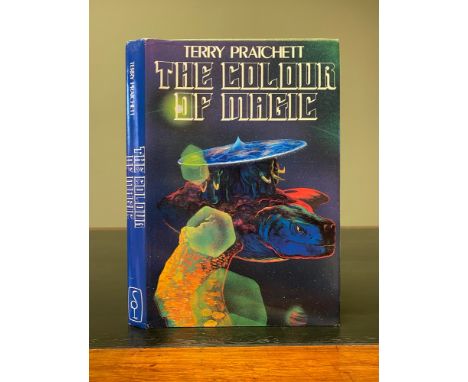 PRATCHETT, Terry. The Colour of Magic, FIRST EDITION, SIGNED &amp; INSCRIBED BY THE AUTHOR, 8vo, publisher's green cloth lett