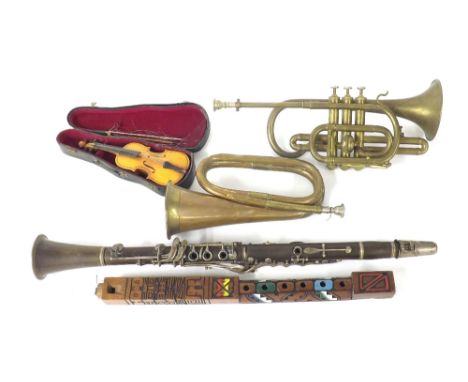 Collection of musical instruments to include a bugle, trumpet, ethnic recorder, clarinet and miniature cased violin with bow 