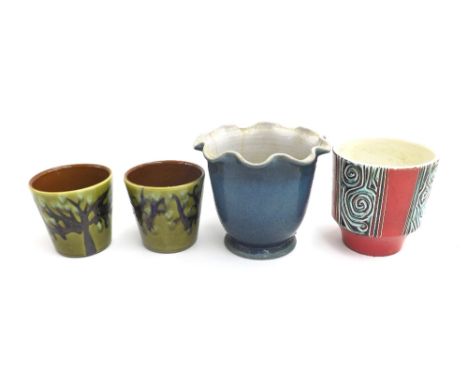 Pair of Poole Pottery plant pots decorated with trees upon an olive green ground, marked ABE493 to base, 4.25" high; together