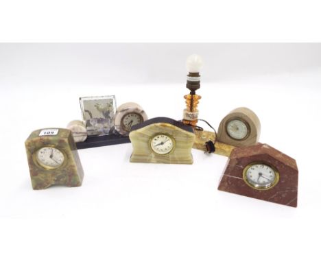 Collection of five various Art Deco wind-up novelty onyx and hardstone clocks, one fitted with a picture frame, the other wit