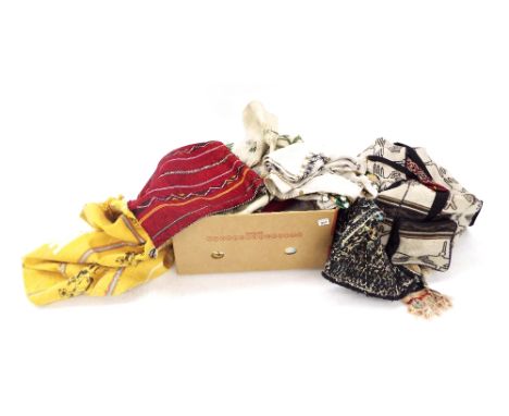 Box containing a collection of ethnic and other textiles