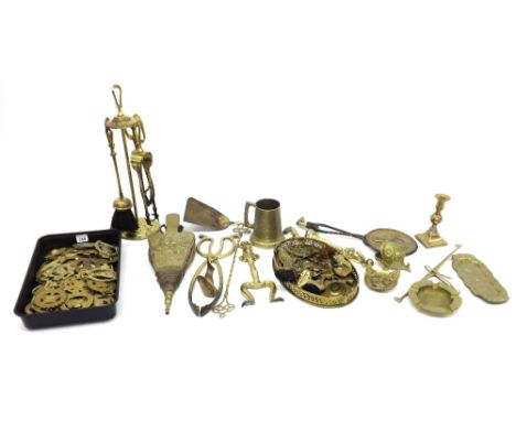 Large collection of brassware to include numerous horse brasses, fire tools etc