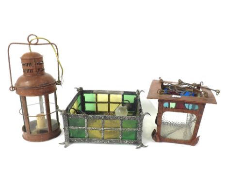Collection of interesting cast metal and coloured glass lighting to include Arts & Crafts ceiling lights, mottled glass lante