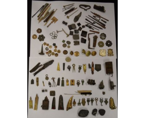 A LARGE COLLECTION OF MEDIEVAL AND LATER BUCKLES, CHAPES, LOCKETS, STRAP-ENDS, DECORATIVE MOUNTS, BODKINS AND PINS together w