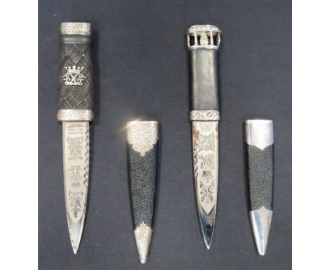 TWO SCOTTISH SILVER-MOUNTED DRESS DAGGERS (SKEAN DHU), EDIINBURGH 1970 AND 1971 the first by Wilkinson, Pall Mall, etched wit