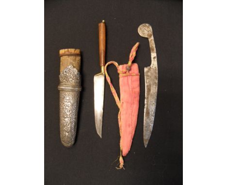 A SMALL INDIAN KNIFE, 19TH CENTURY, ANOTHER, EUROPEAN, LATE 17TH CENTURY AND AN INDIAN SILVER SWORD CHAPE, 19TH CENTURY the f