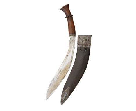 A NEPALESE SILVER-MOUNTED KUKRI KNIFE, LATE 19TH CENTURY with curved single-edged blade notched at the forte, hardwood grip c