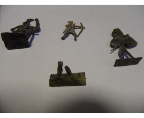 TWO LEAD-ALLOY TOY SOLDIERS AND THE BASE OF ANOTHER one representing a musketeer and one a drummer (lacking its head), found 