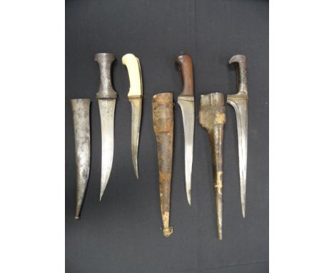 TWO INDO-PERSIAN DAGGERS (PESH-KABZ), AN AFGHAN DAGGER (CHOORA) AND A PERSIAN DAGGER (JAMBIYA), 18TH/19TH CENTURY the first w