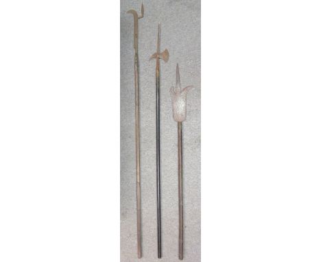 A LOCAHABER AXE IN 17TH CENTURY STYLE, 19TH CENTURY, A HALBERD AND A BILL 19TH CENTURY the first with flat head extending to 