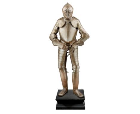 **A COMPOSITE CAP-A-PIE FIELD ARMOUR, MAINLY ITALIAN, 16TH AND EARLY 17TH CENTURIES WITH ETCHED AND GILT DECORATION OF THE 19
