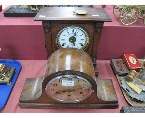 Late XIX Century oak mantel clock 'Fattorini Sons' Bradford patent automatic alarm together with a 1930s oak Napoleon style m