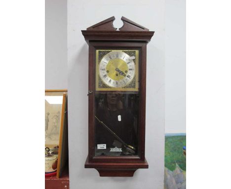 Mahogany Cased Wall Clock, top with a broken pediment, glazed door, silvered chapter ring, shaped base.