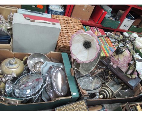 A collection of metalware to include plated teapot, jugs, bowls, plates and tray, brass wall sconce and table lamp with petal