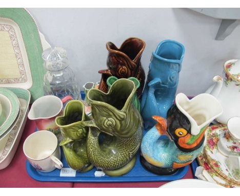 A quantity of ceramic fish jugs including Devon 'Plymouth Gin', Royal Winton and Dartmouth together with a decanter and comme