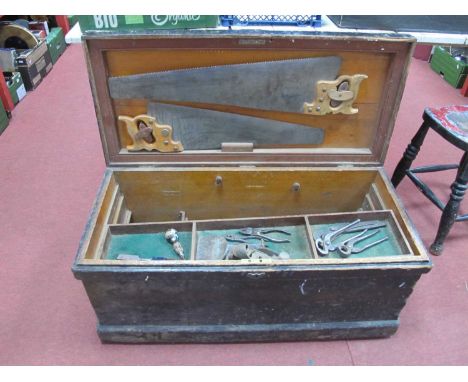 Black Painted Pine Tool Chest, tool contents include saws, chisels, pliers, and other tools. 92cm width.