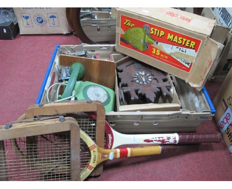 The Stip Master film strip projector in box, cuckoo clock, children's sewing machine and two vintage tennis rackets one Slaze