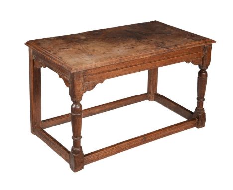 An oak side table, 17th century and later, 125cm wide, 66cm deep, 77cm high 
