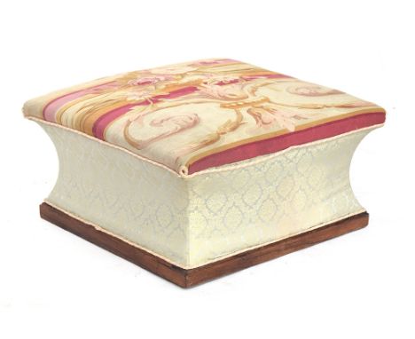 A 19th century rosewood ottoman of sarcophagus form, the tapestry upholstery depicting a stand of flowers, on castors, 82cm s