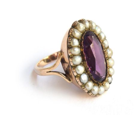 A Georgian amethyst paste and pearl ring, mounted in gold, size N, approx. 7.8g 