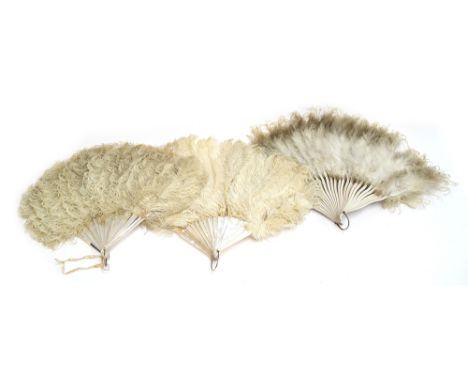 Two early 20th century ostrich feather hand fans, one with mother of pearl sticks, 40cm long 