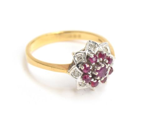 An 18ct gold, diamond and ruby floral cluster ring, size Q 1/2, approx. 4g 
