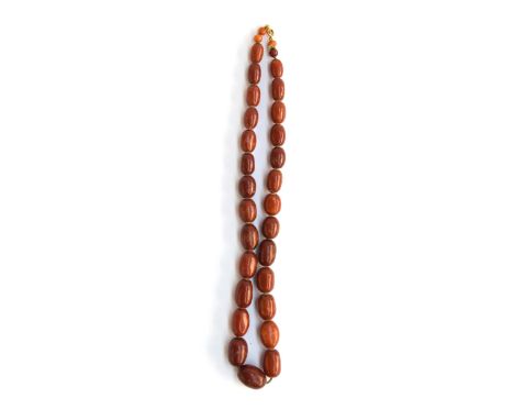 A graduated cognac amber bead necklace, approx. 59g, 57cm long