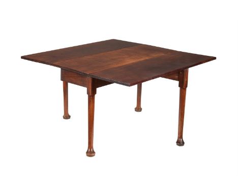 A George II mahogany drop leaf table, circa 1750, the drop leaf top above turned supports and pad feet, 122cm wide, 122cm dee
