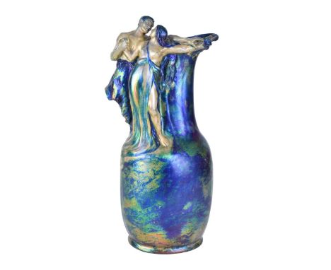 Zsolnay Eosin Glazed Ewer with Figural Handle. Raised maker's mark and numbered 8068 to base. Measures 15-1/4" H. Condition: 