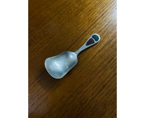 A GEORGE V SILVER CADDY SPOON BY JOSEPH COOK &amp; SON - THE SHOVEL SHAPED BOWL INSCRIBED 'INVERNESS' TO THE FRONT AND WITH B