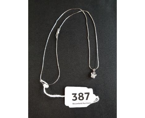 18 CARATWHITE GOLD DIAMOND BUTTERFLY PENDANT ON 18 CARAT GOLD CHAIN