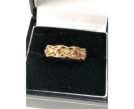Vintage diamond and ruby ring set all around with rubies and diamonds weight 6g 