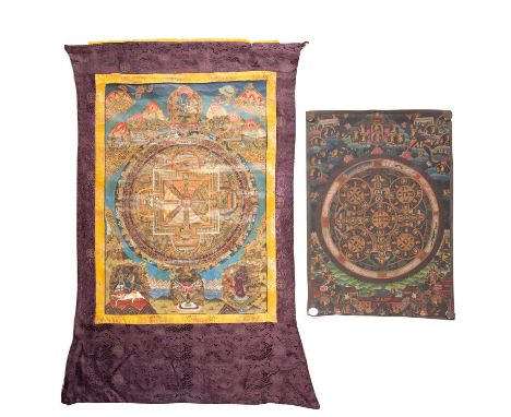 2 Thangkas. TIBET, 19./20. Jh., jeweils mit Mandaladarstellung, Tempera auf Baumwollgewebe: 1.) 72,5 x51 cm (115 x69 cm mit B