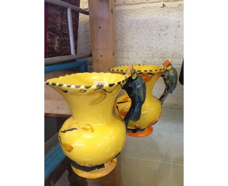 A pair of Wadeheath Art Deco china jugs with Bird handles (one af).