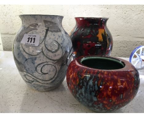 Three various modern Poole Pottery vases.