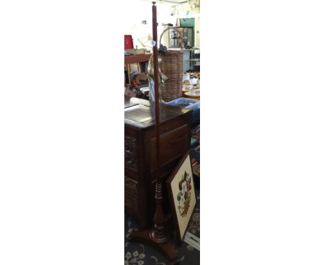 A mahogany pole screen with later tapestry screen.