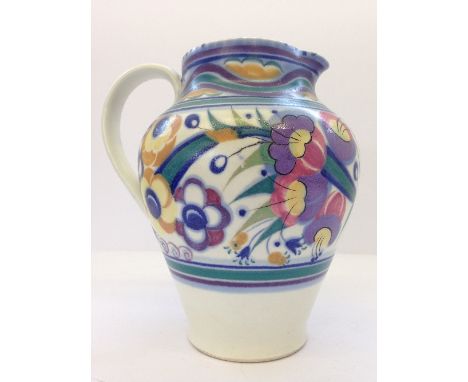 A Poole Pottery single handle jug, shape 950, decorated in the YO pattern.