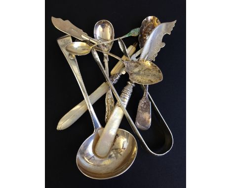 A small Georgian silver ladle together with a small quantity of other silver to include spoons.