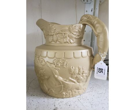 A 19th century style china relief jug, decorated with a Hunting Scene with Greyhound handle.
