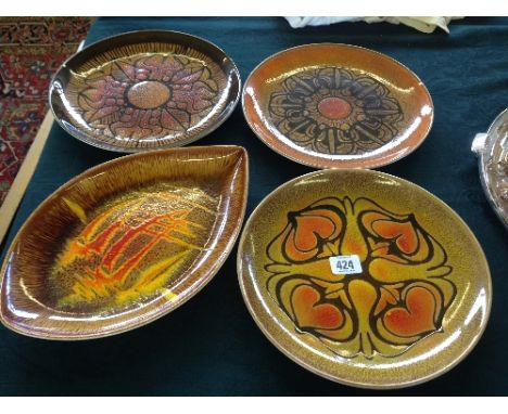 Four various Poole Pottery Aegean dishes.