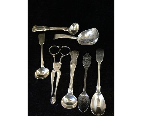 A small silver Georgian caddy spoon together with a pair of silver sugar nips and various other silver items (138 grams overa