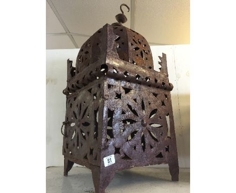 A large Eastern style open metal work lantern.