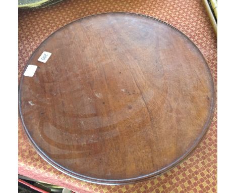 A vintage mahogany lazy Susan.