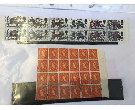 A folder containing a collection of various Great Britain pre-decimal mint blocks and traffic light blocks in full mint condi